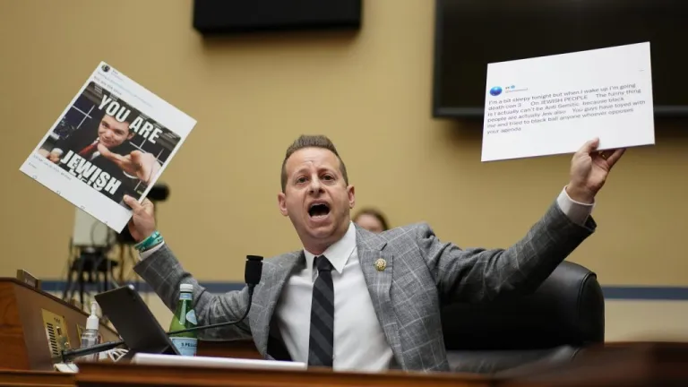 Rep. Jared Moskowitz (D-FL) holds up tweets during a House Committee on Oversight and Accountability hearing on Capitol Hill, Wednesday, Feb. 8, 2023.