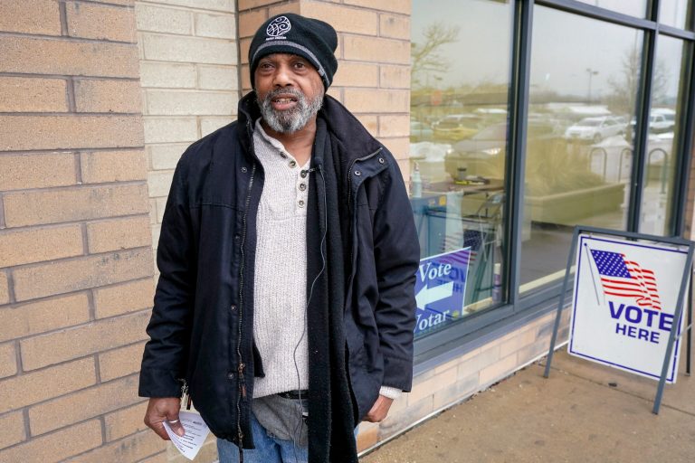 Andre Childs talks about voting after casting an early ballot at a polling station Thursday, Feb. 9, 2023, in Milwaukee.