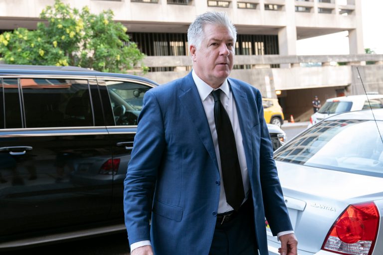 Attorney M. Evan Corcoran arrives at federal court in Washington, July 22, 2022. Justice Department prosecutors investigating the mishandling of classified documents at Donald Trump's Florida estate are seeking to pierce the attorney-client privilege. They want to again question Corcoran, one of former President Donald Trump's lawyers, before a grand jury.