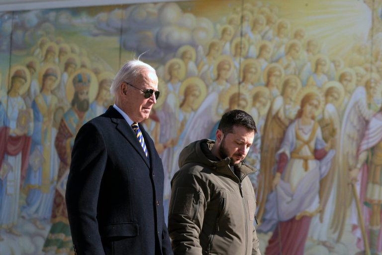 President Joe Biden, left, walks with Ukrainian President Volodymyr Zelensky at St. Michaels Golden-Domed Monastery.