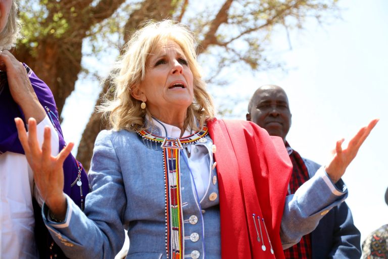 US first Lady Jill Biden, left, greets women of the Maasai community as they explain the drought situation in Ngatataek, Kajiado Central, Kenya, Sunday, Feb. 26, 2023. Biden is in Kenya on the second and final stop of her trip.
