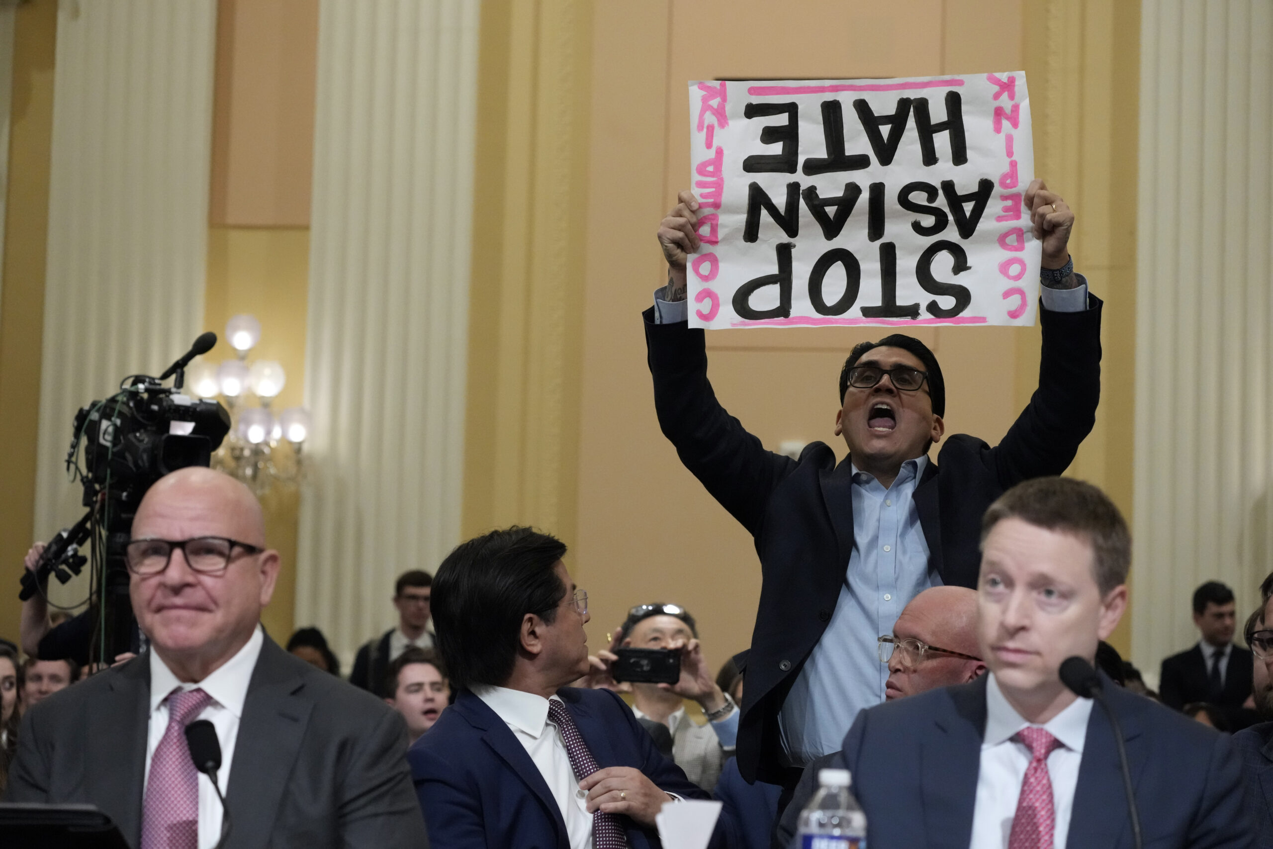 Protesters thrown out of House China committee’s first prime-time hearing