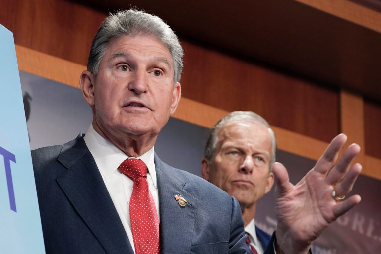 Sen. Joe Manchin, D-W. Va., left, and Sen. John Thune. R-S.D., right, speak during the news conference to introduce the Restricting the Emergence of Security Threats that Risk Information Communications Technology Act, or RESTRICT Act, Tuesday, March 7, 2023, on Capitol Hill in Washington. 