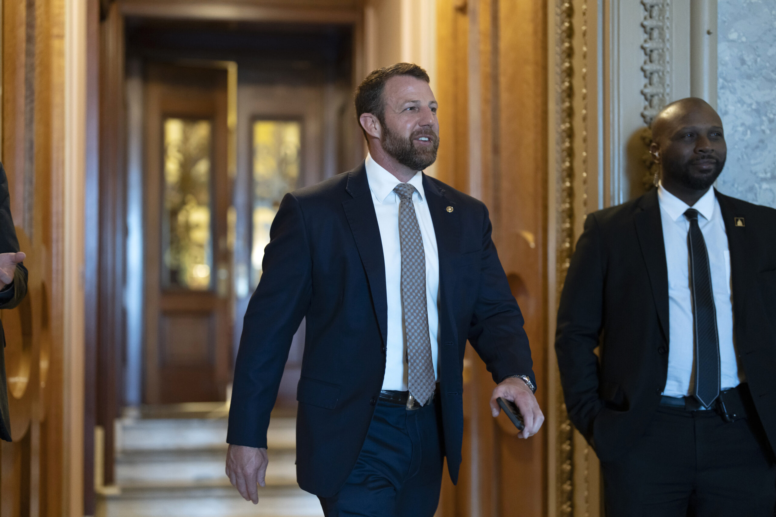 Republican senator challenges union boss to cage fight