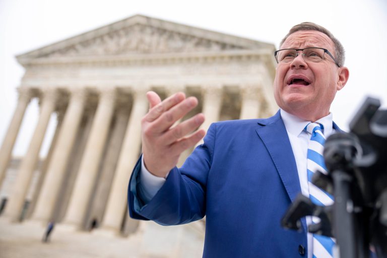 FILE - North Carolina House Speaker Tim Moore speaks in front of the Supreme Court in Washington, Dec. 7, 2022.