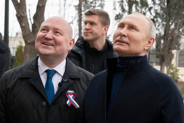 Putin makes unexpected trip to Crimea on annexation anniversary
