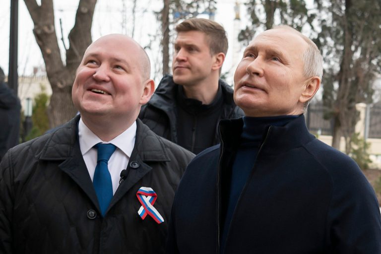Putin makes unexpected trip to Crimea on annexation anniversary