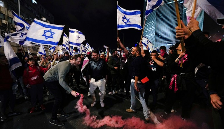 Demonstrators protest against plans by Prime Minister Benjamin Netanyahu's government to overhaul the Israel's judicial system in Tel Aviv, Israel.