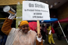 LA school strike: Teachers dance in the rain while parents scramble for child care