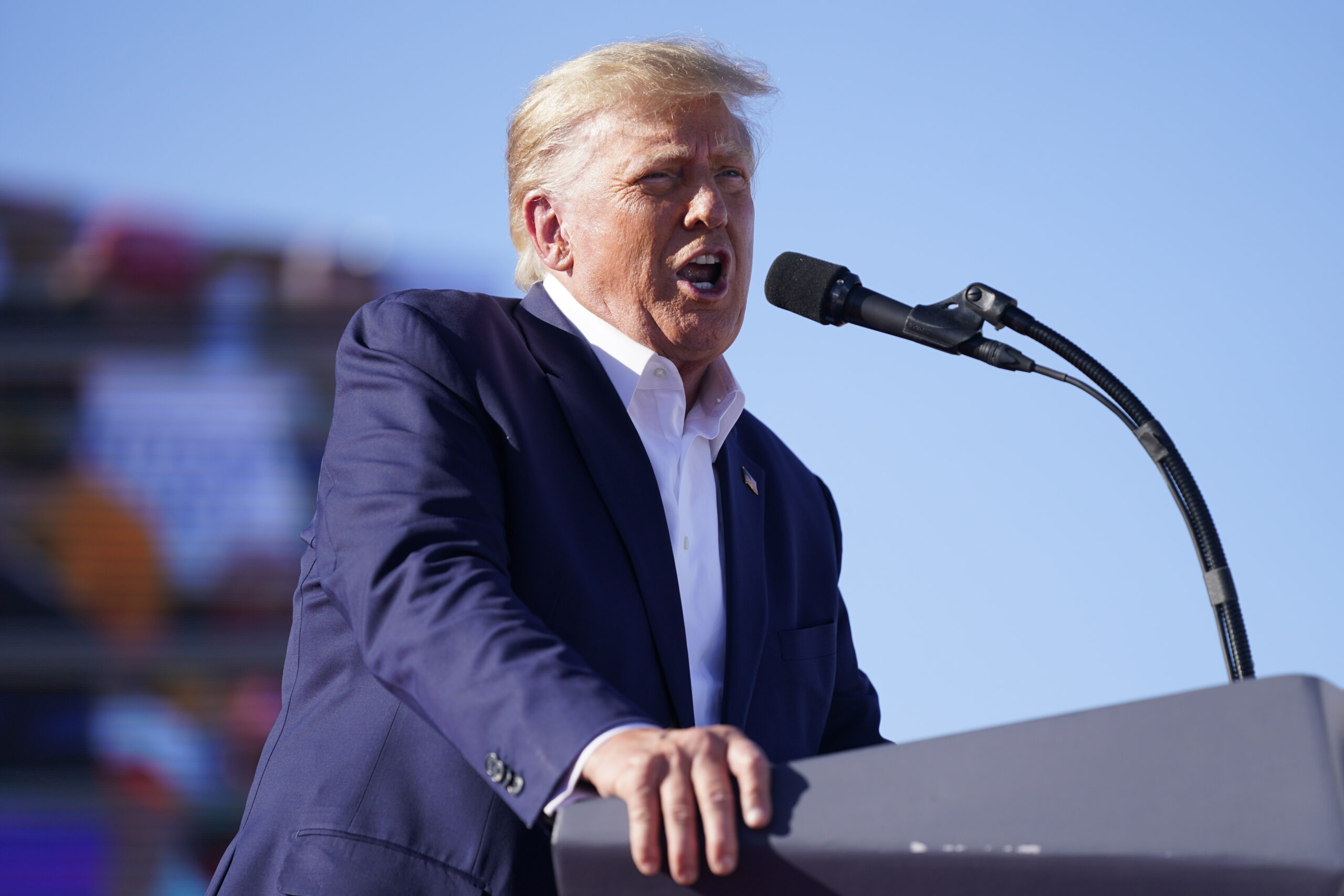 Trump slams looming charges at first rally since indictment news