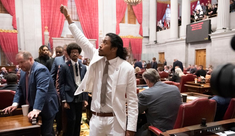 Former Rep. Justin Jones, D-Nashville, raises his fist on the floor of the House chamber as he walks to his desk to collect his belongings after being expelled from the legislature on Thursday, April 6, 2023, in Nashville, Tenn.