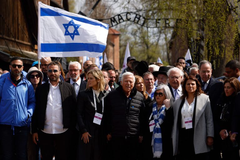 Patriots owner leads Holocaust march with rapper Meek Mill