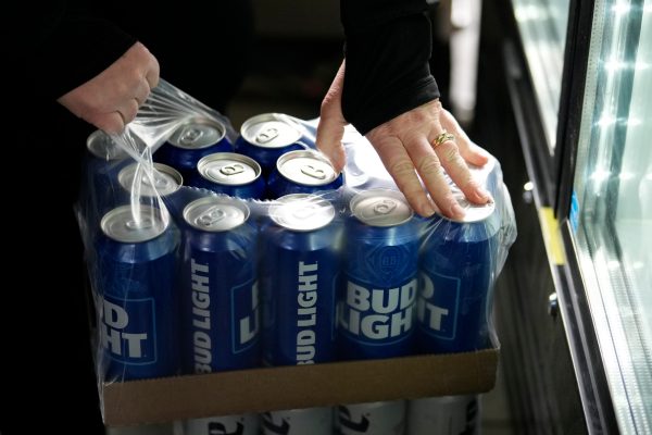 Anheuser-Busch hopes to win back angry customer base with free cases of Bud Light