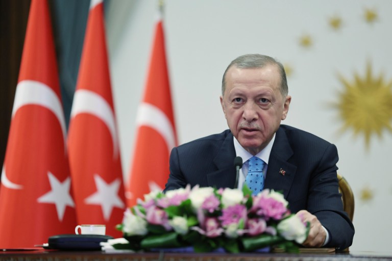 In this handout photo released by Turkish Presidency, Turkey's President Recep Tayyip Erdogan inaugurates Turkey's first nuclear power plant via a video link, at the Presidential palace in Ankara, Thursday, April 27, 2023. 