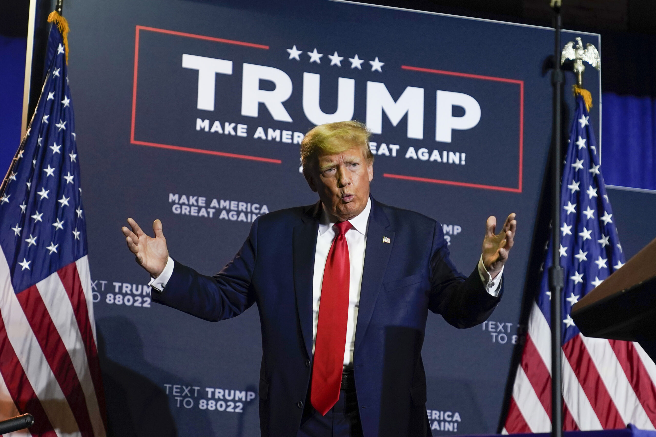 Trump follows business model by slapping his name on trade plan