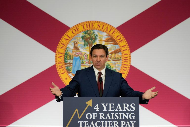 Florida Governor Ron DeSantis speaks during a news conference to sign several bills related to public education and increases in teacher pay, in Miami, Tuesday, May 9, 2023. 