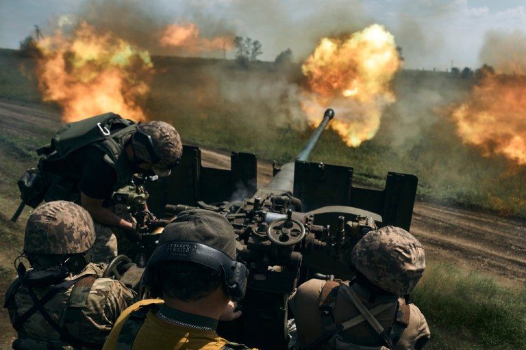 Ukrainian soldiers fire a cannon near Bakhmut, an eastern city where fierce battles against Russian forces have been taking place, in the Donetsk region, Ukraine, Monday, May 15, 2023.