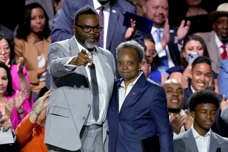 Chicago Mayor-elect Brandon Johnson acknowledges outgoing Mayor Lori Lightfoot during his inauguration as the city's 57th mayor on Monday, May 15, 2023, in Chicago.