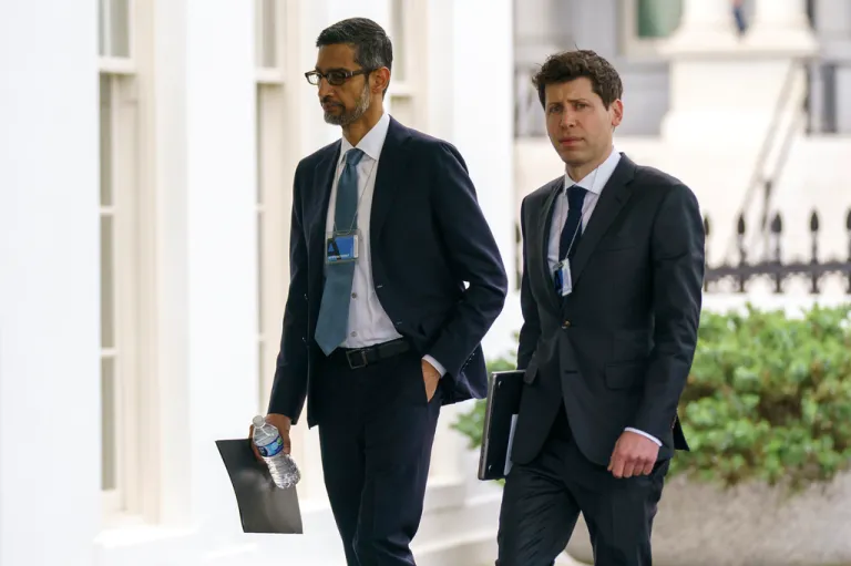 Alphabet CEO Sundar Pichai, left, and OpenAI CEO Sam Altman arrive to the White House for a meeting with Vice President Kamala Harris on artificial intelligence, Thursday, May 4, 2023, in Washington. As concerns grow over increasingly powerful artificial intelligence systems like ChatGPT, the nation's financial watchdog says it's working to ensure that companies follow the law when they're using AI. 