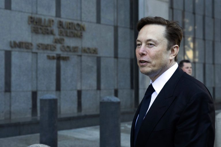 FILE - Elon Musk departs the Phillip Burton Federal Building and United States Court House in San Francisco on Tuesday, Jan. 24, 2023.