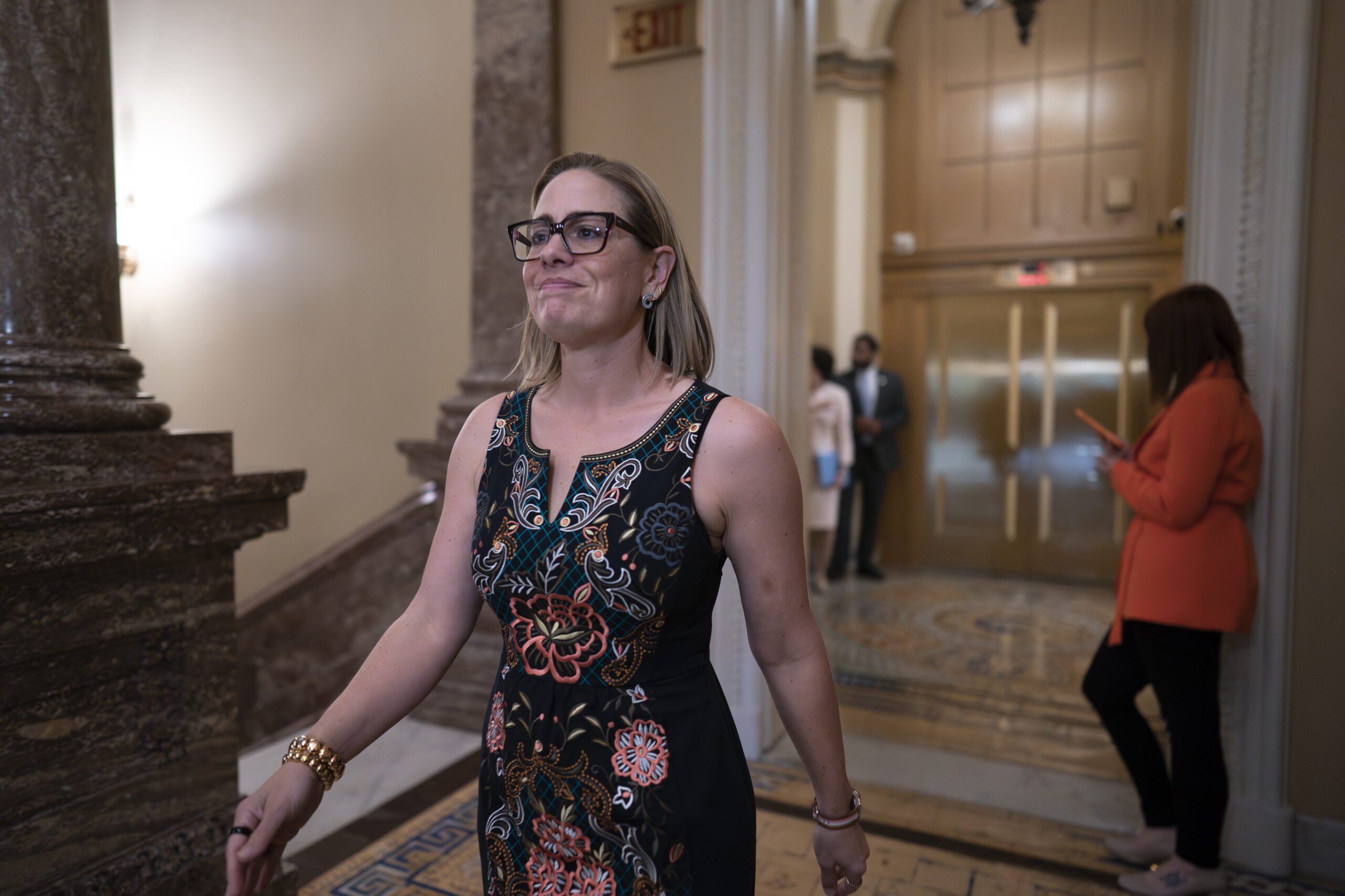 Sinema drops hint about 2024 plans with victory lap on huge spending bill