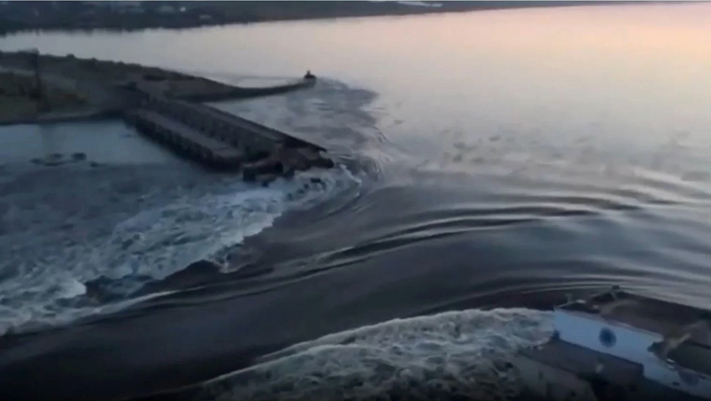 Russia and Ukraine play dam explosion blame game, White House still assessing