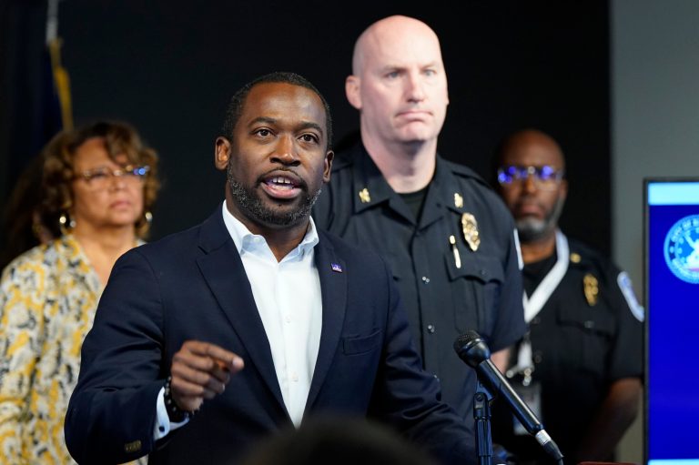 Richmond Mayor Levar Stoney, left, speaks as Richmond interim Police Chief Rick Edwards listens during a news conference, Wednesday, June 7, 2023, in Richmond, Virginia.