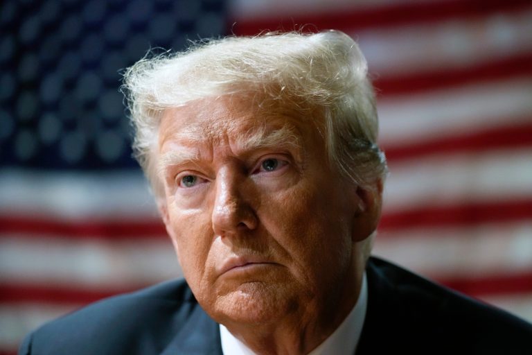 FILE - Former President Donald Trump attends an event with supporters at the Westside Conservative Breakfast, in Des Moines, Iowa, Thursday, June 1, 2023. (AP Photo/Charlie Neibergall, File)