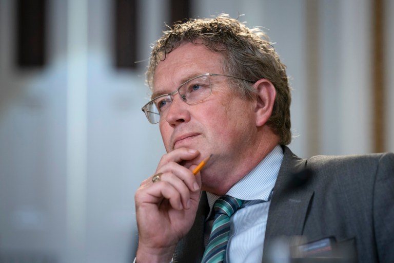 Rep. Thomas Massie (R-KY) listens as the House Rules Committee prepares a bill to reverse a Biden administration firearms-related regulation on so-called pistol braces, a stabilizing feature championed by some members of the conservative House Freedom Caucus, at the Capitol in Washington, Monday, June 12, 2023.