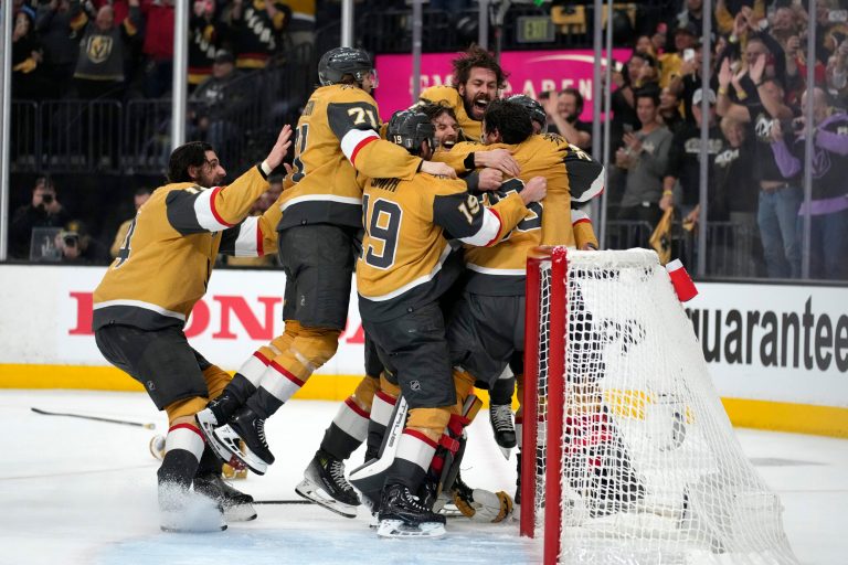 Members of the Vegas Golden Knights celebrate after they defeated the Florida Panthers 9-3 to win the Stanley Cup in Game 5 of the NHL hockey Stanley Cup Finals Tuesday, June 13, 2023, in Las Vegas. 