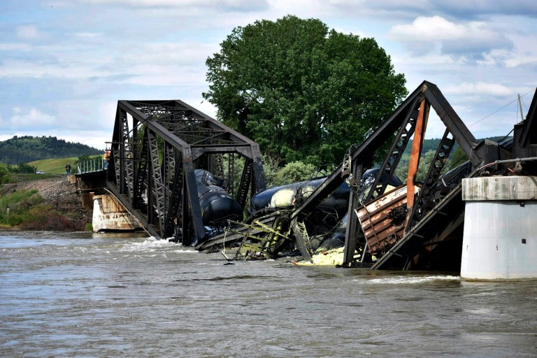 Derailed train on collapsed bridge contaminates Yellowstone River