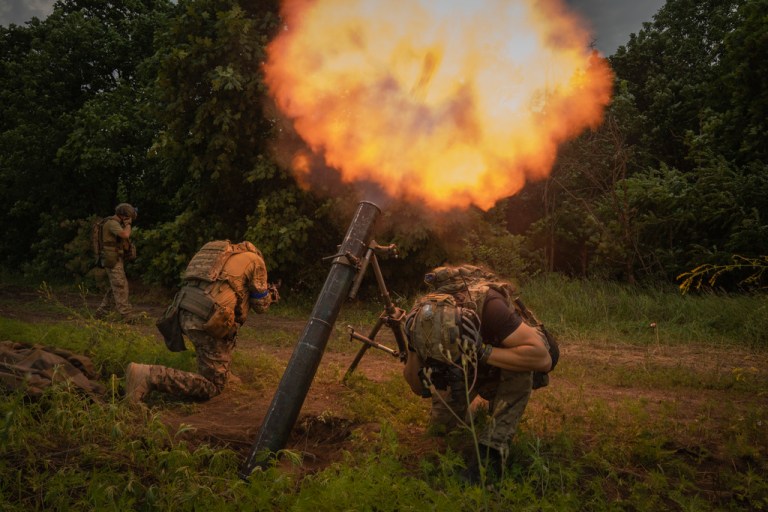 Ukrainian soldiers fire toward the Russian position on the front line in the Zaporizhzhia region on Saturday, June 24, 2023. 