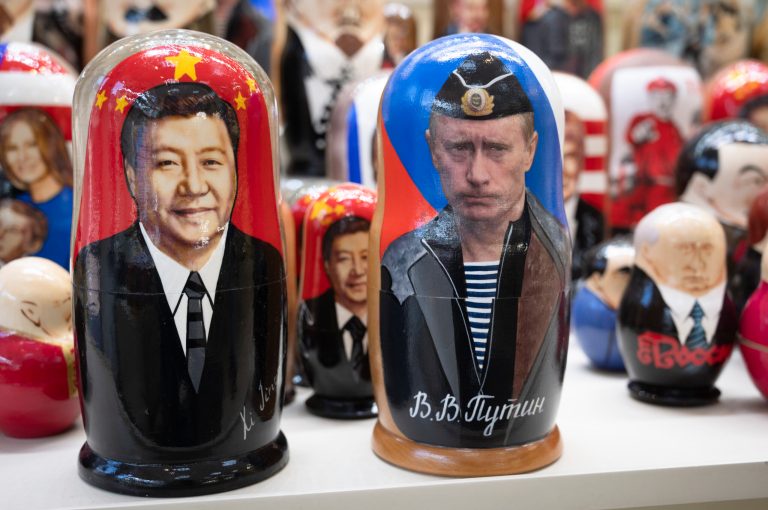 FILE - Russian matryoshka dolls with portraits of Chinese President Xi Jinping, left, and Russian President Vladimir Putin are displayed among others for sale at a souvenir shop in Moscow, Russia, on March 21, 2023. (AP Photo/Dmitry Serebryakov, File)