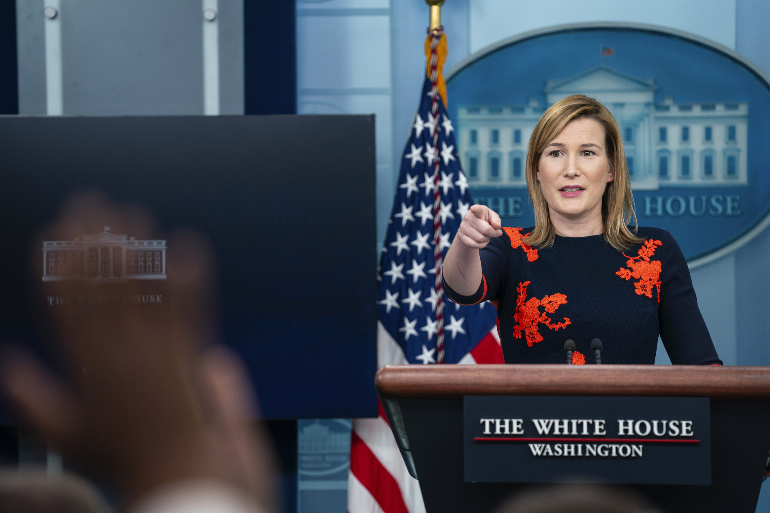 Olivia Dalton steps behind the White House briefing podium