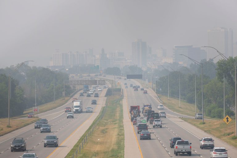 Haze obscures the skyline in Cedar Rapids, Iowa, on Tuesday, June 27, 2023. Smoke from wildfires in Canada caused low air quality and obscured visibility. 