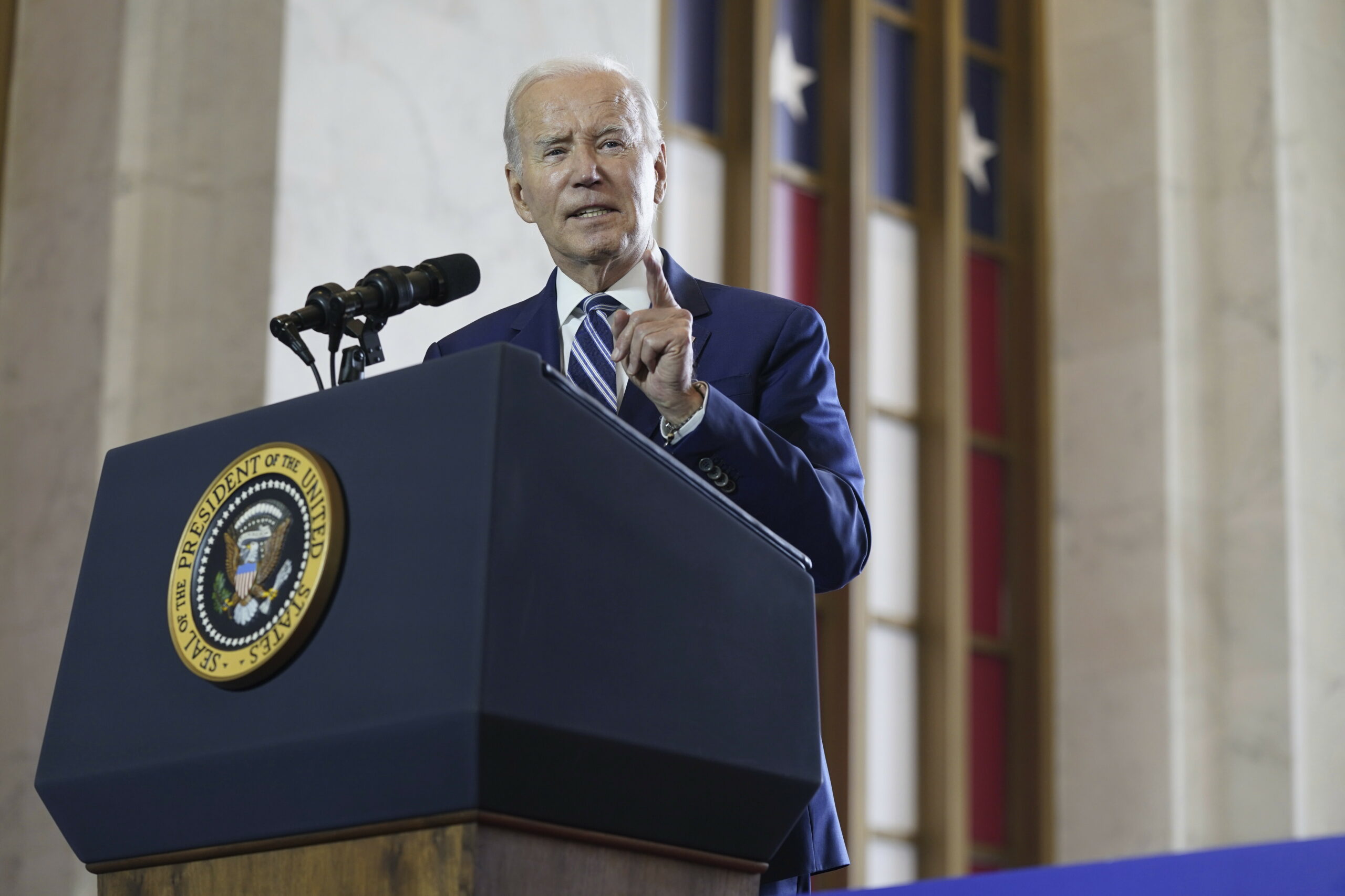 Bidenomics taxes workers through inflation to fund green industrial policy
