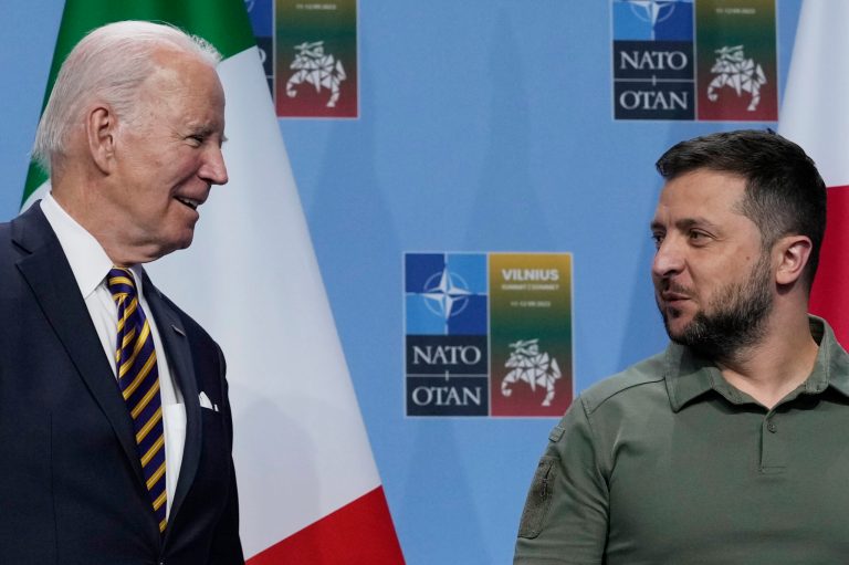Senators back Biden opposition to Ukraine joining NATO while still at war President Joe Biden, left, and Ukraine's President Volodymyr Zelenskyy, talk on stage during an event with G-7 leaders on the sidelines of the NATO summit in Vilnius, Lithuania, Wednesday, July 12, 2023, to announce a joint declaration of support for Ukraine.