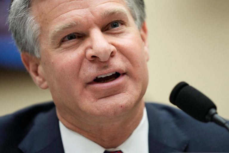 FBI Director Christopher Wray testifies at a hearing on Capitol Hill in Washington. 