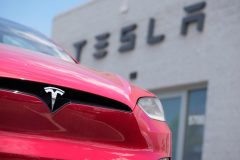 Tesla lowers price of sedan and SUV to help buyers get tax break