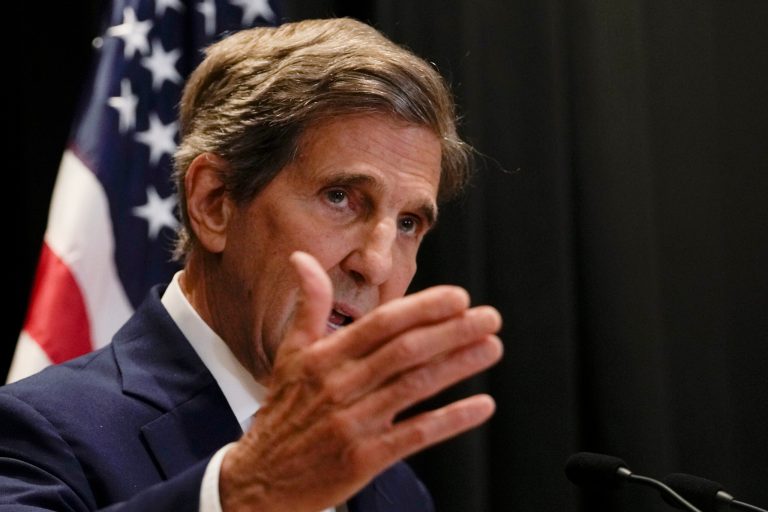 U.S. climate envoy John Kerry gestures as he speaks during a press conference following in Beijing in July 2023. Kerry will announce Monday that the U.S. will outline a new nuclear fusion strategy at this year's COP28 summit in Dubai. (AP Photo/Andy Wong)