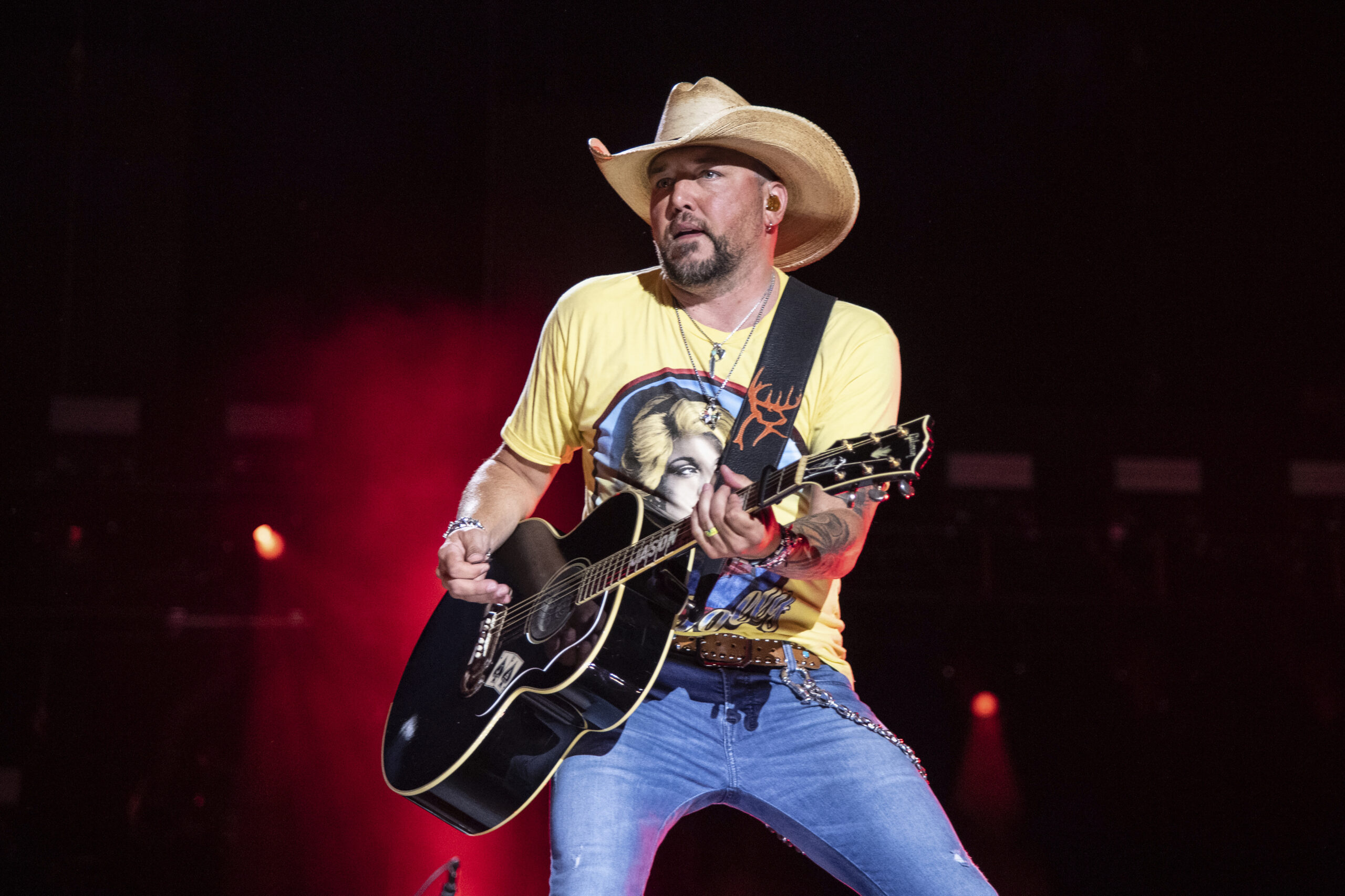 Jason Aldean concert draws flag-burning protest and Second Amendment group’s support