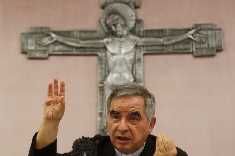 FILE - Cardinal Angelo Becciu talks to journalists during press conference in Rome, on Sept. 25, 2020. (AP Photo/Gregorio Borgia, File)