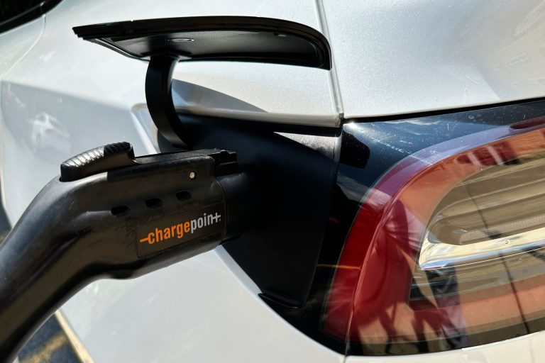 A Tesla vehicle is charged by a EV charging station on the campus of North Central College in Naperville, Illinois on Thursday, July 20, 2023. On Sept. 14, the House of Representatives passed the Preserving Choice in Vehicle Purchases Act to block state attempts to eliminate the sale of gas-powered cars.