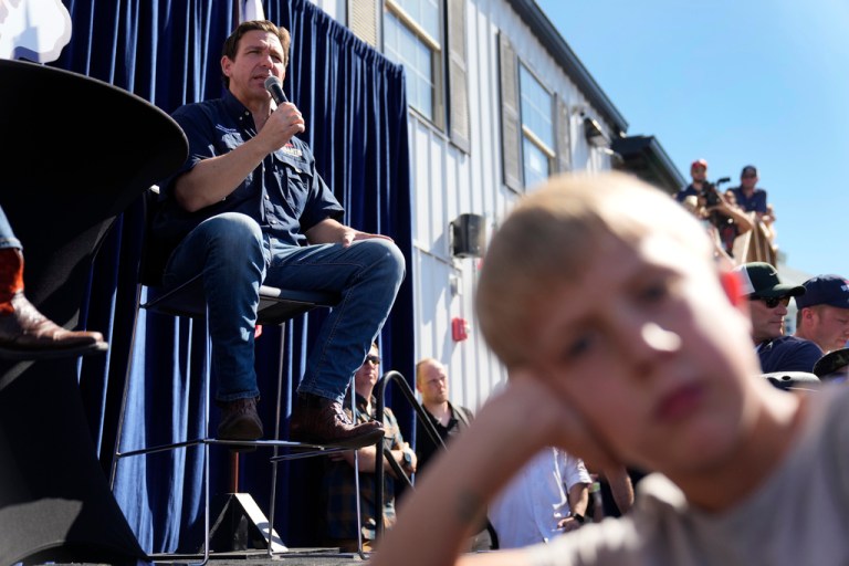 Gov. Ron DeSantis (R-FL) takes part in a Fair-Side Chat with Gov. Kim Reynolds (R-IA), left, at the Iowa State Fair, Saturday, Aug. 12, 2023.