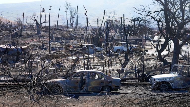 Destroyed homes and cars on Aug. 13, 2023, in Lahaina, Hawaii.