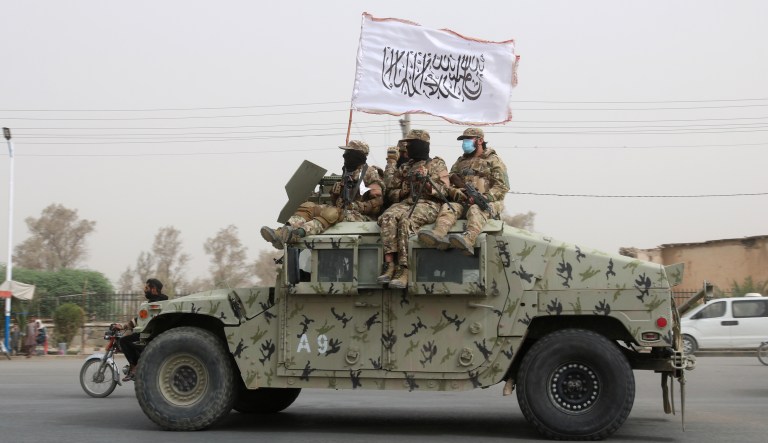 Taliban fighters patrol on the road during a celebration marking the second anniversary of the withdrawal of U.S.-led troops from Afghanistan, in Kandahar, south of Kabul, Afghanistan, Tuesday, Aug. 15, 2023. More than 200 extrajudicial killings of former Afghan government officials and security forces have taken place since the Taliban took over the country two years ago, according to a U.N. report released Tuesday, Aug. 22. The most targeted groups have been former army, police and intelligence forces, according to the report from the United Nations Assistance Mission in Afghanistan.