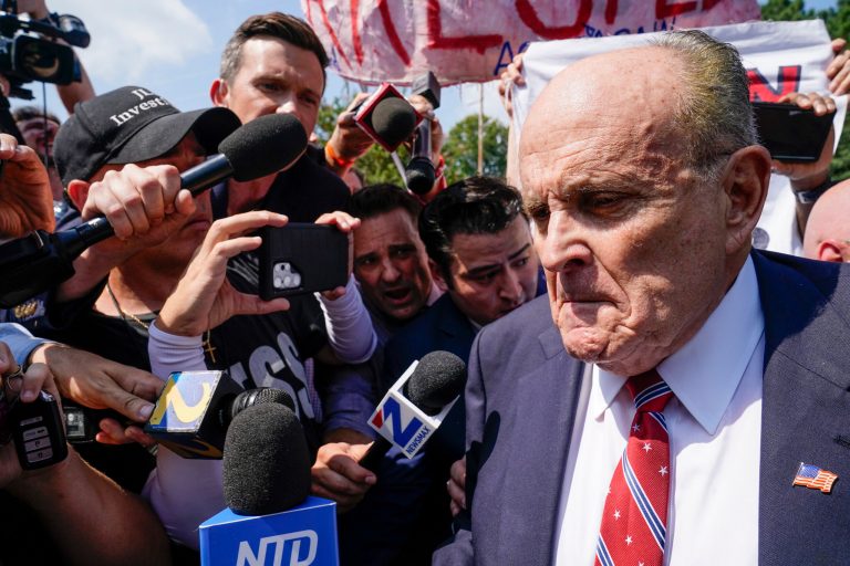 Rudy Giuliani speaks outside the Fulton County jail, Wednesday, Aug. 23, 2023, in Atlanta. (AP Photo/Brynn Anderson)