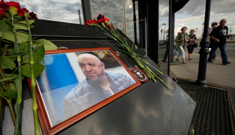 A portrait of the owner of private military company Wagner Group Yevgeny Prigozhin is installed at an informal memorial at a cafe owned by a Prigozhin's company in St. Petersburg, Russia, Friday, Aug. 25, 2023. A preliminary U.S. intelligence assessment has found that the plane crash presumed to have killed Wagner leader Yevgeny Prigozhin was intentionally caused by an explosion.