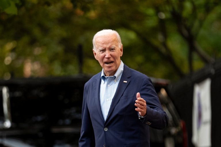 President Joe Biden answers a reporter's question as he leaves Holy Trinity Catholic Church in the Georgetown section of Washington, Sunday, Aug. 27, 2023. 
