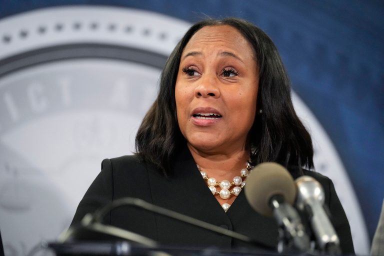 FILE - Fulton County District Attorney Fani Willis speaks in the Fulton County Government Center during a news conference Aug. 14, 2023, in Atlanta. (AP Photo/John Bazemore, File)
